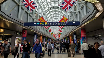 Flyers at Washington Reagan National Airport. Eight airlines are duking it out for the five additional daily roundtrip slot pairs that the DOT is authorized to award for flights beyond the 1,250-mile perimeter at the airport.