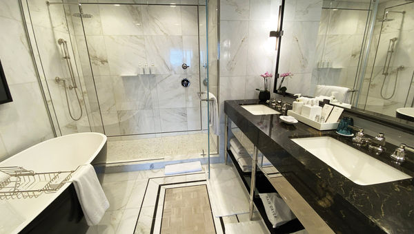 Bathrooms include spacious rainfall showers, with higher-end accommodations also including soaking tubs. Bathrooms include spacious rainfall showers, with higher-end accommodations also including soaking tubs.
