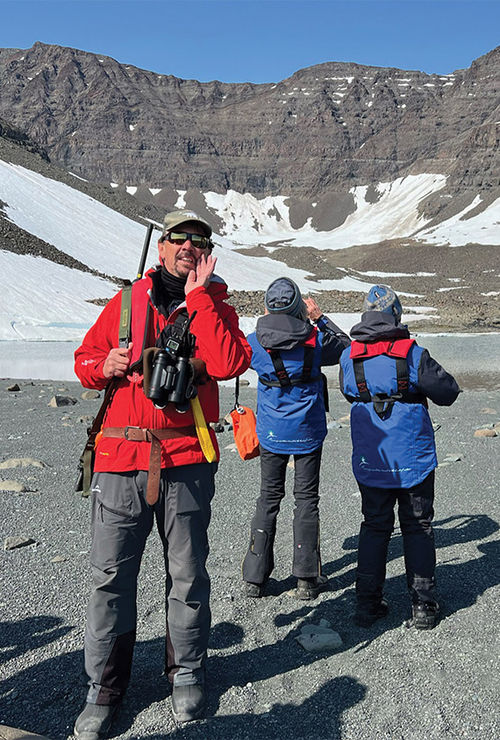 Expedition leader Howard Whelan overseeing a landing on the east coast of Greenland. Expedition leader Howard Whelan overseeing a landing on the east coast of Greenland.