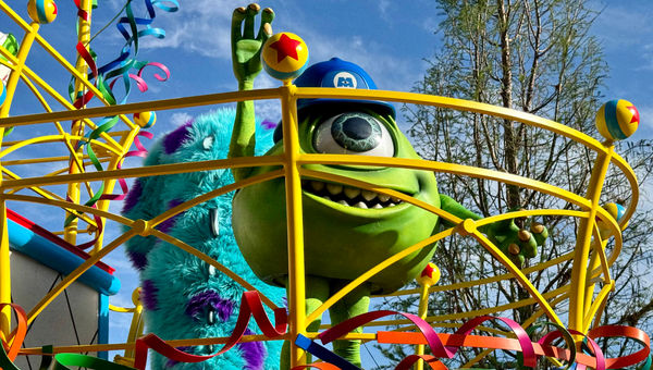 In the finale of the Better Together parade, Mike Wazowski of "Monsters, Inc." waves to the crowd. In the finale of the Better Together parade, Mike Wazowski of "Monsters, Inc." waves to the crowd.