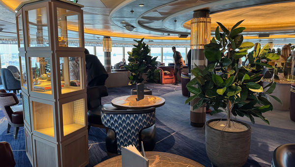 The Commodore Club on the Queen Anne is a spacious forward lounge and a Cunard staple. The Commodore Club on the Queen Anne is a spacious forward lounge and a Cunard staple.