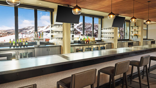 The hotel's Saddles Lounge is located on the lobby level facing the slopes. The hotel's Saddles Lounge is located on the lobby level facing the slopes.