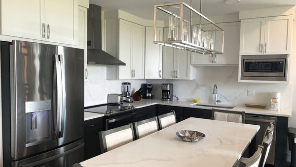 The kitchen of a condo unit adjacent to the main resort. Condo owners can enjoy resort amenities and have their units managed by the resort's rental program. The kitchen of a condo unit adjacent to the main resort. Condo owners can enjoy resort amenities and have their units managed by the resort's rental program.