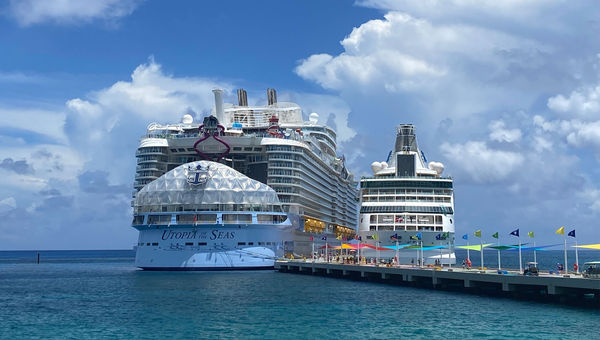 The Utopia of the Seas, the second-largest cruise ship on Earth, docked next to the Vision of the Seas at Perfect Day at Coco Cay. The Utopia of the Seas, the second-largest cruise ship on Earth, docked next to the Vision of the Seas at Perfect Day at Coco Cay.